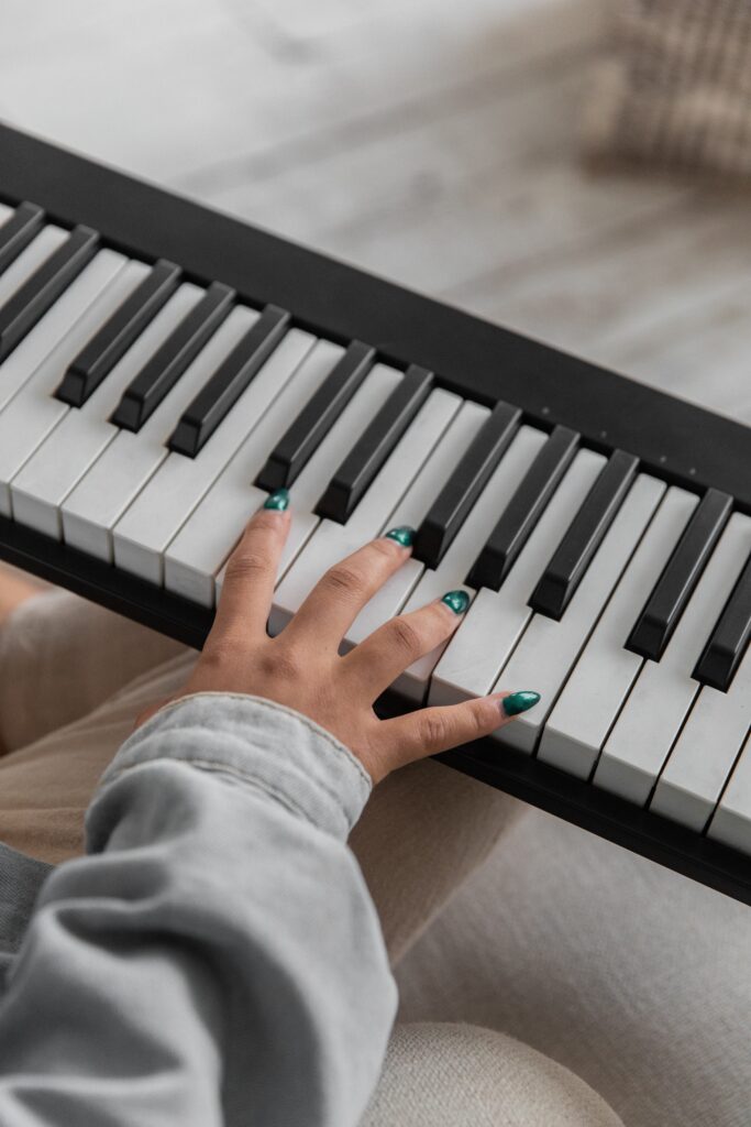 Digital Piano played by a women